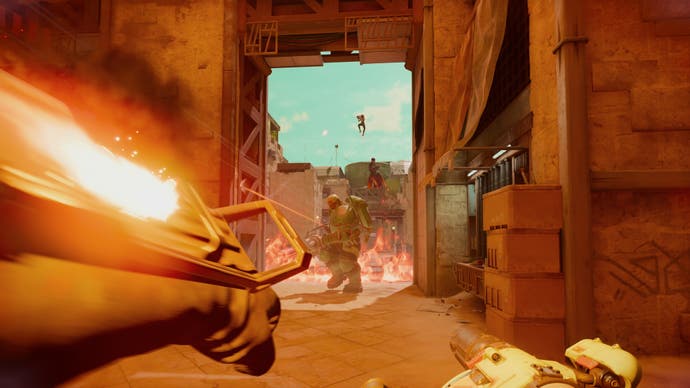 Concord image showing an enemy tank coming through a doorway of a sandy map as you aim an ability at them