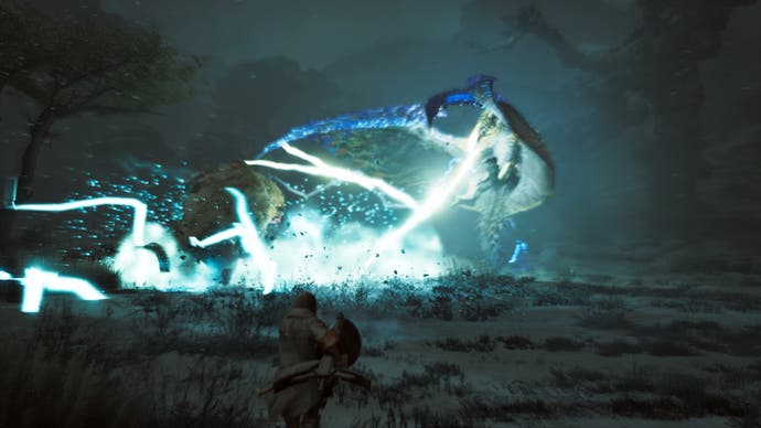 Monster Hunter Wilds official image showing a glowing blue monster and AoE attack