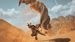 Monster Hunter Wilds official image showing a hunter diving away from a big sandworm creature